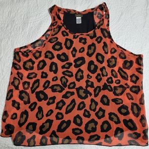 Tank sheer coral with cheetah print and stretchy built in black tank. Lavish M